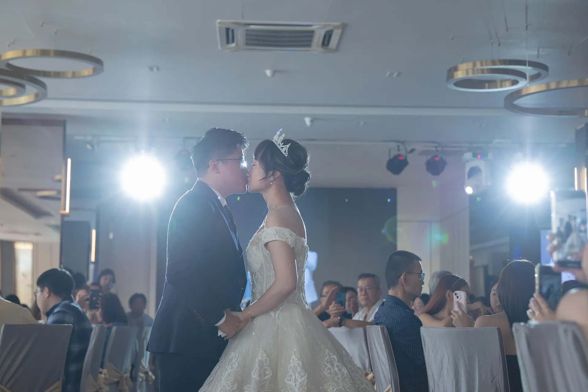 The newlyweds kiss